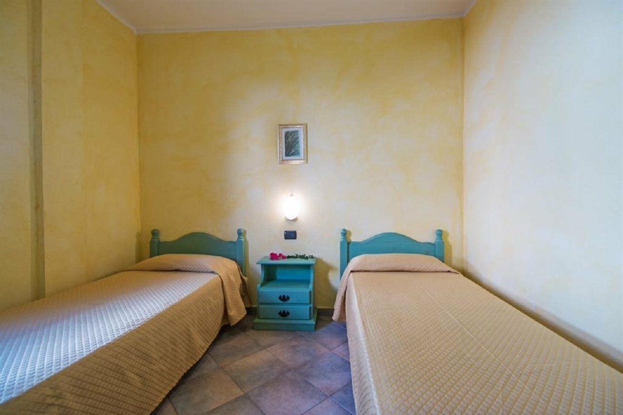 Albergo Residenziale Gli Ontani Cala Liberotto Exterior foto